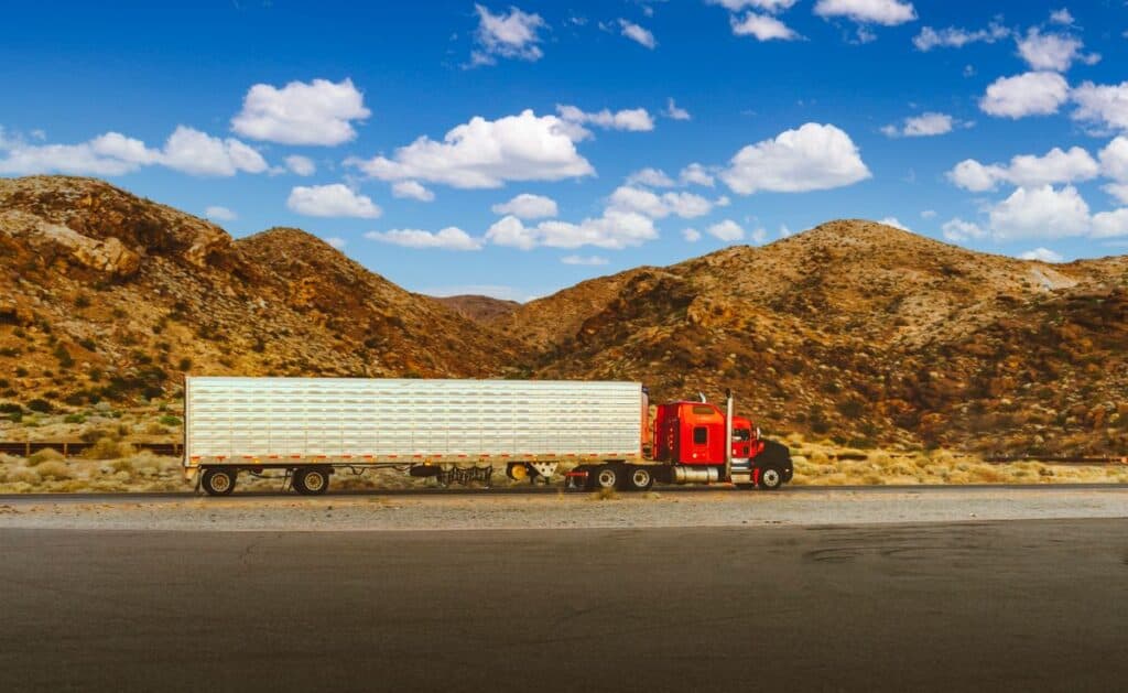 Transportation manager hiring: a logistics leader overseeing a fleet of freight trucks